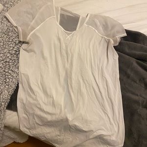 White Lululemon Top size 2 with sheer paneling and cutout tie back